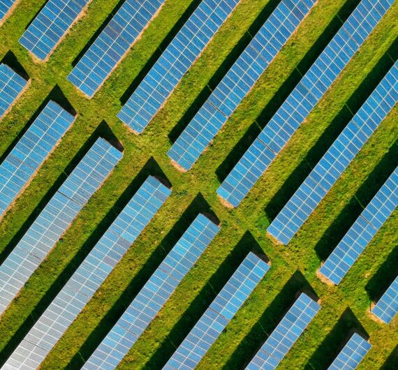 An aerial inspection of a solar farm using a drone.